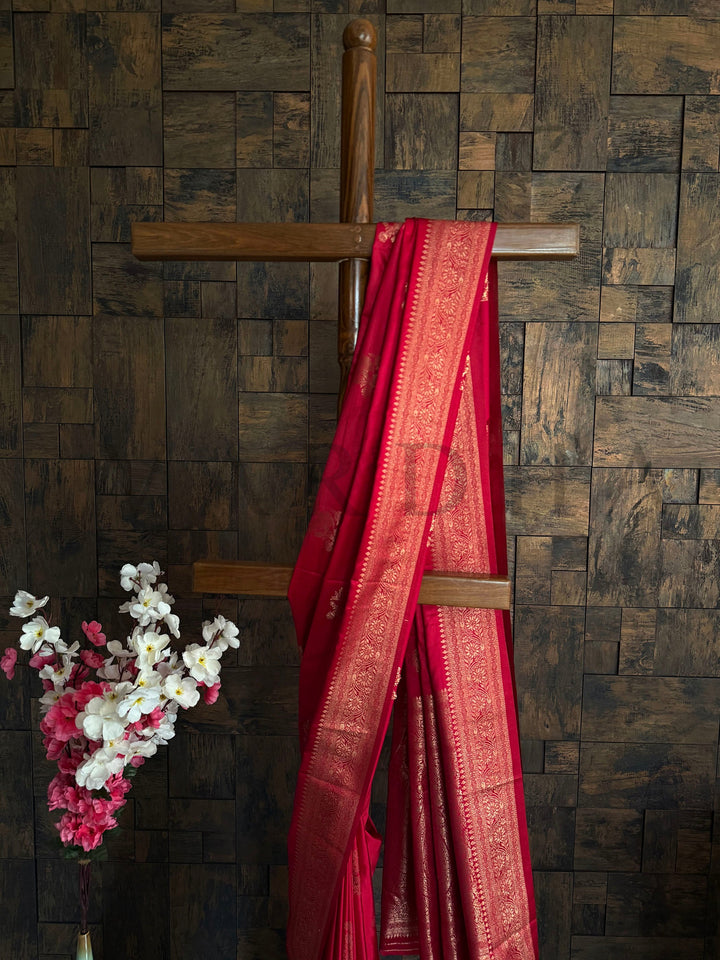 Elegant satin saree for haldi guests or family functions in red and gold