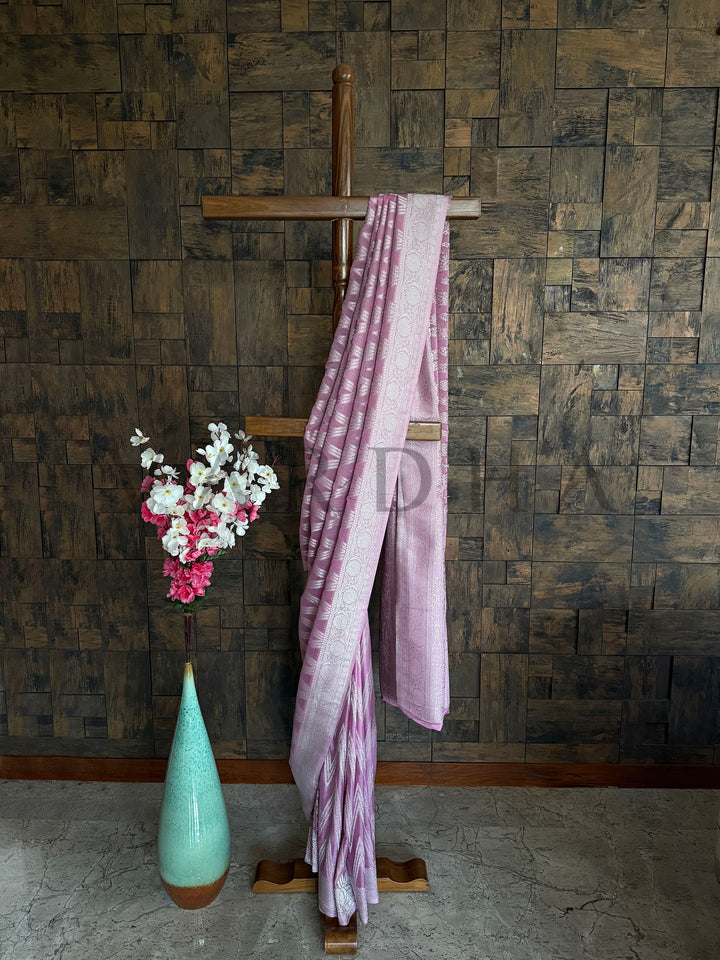 Full view of pink saree with subtle border detail