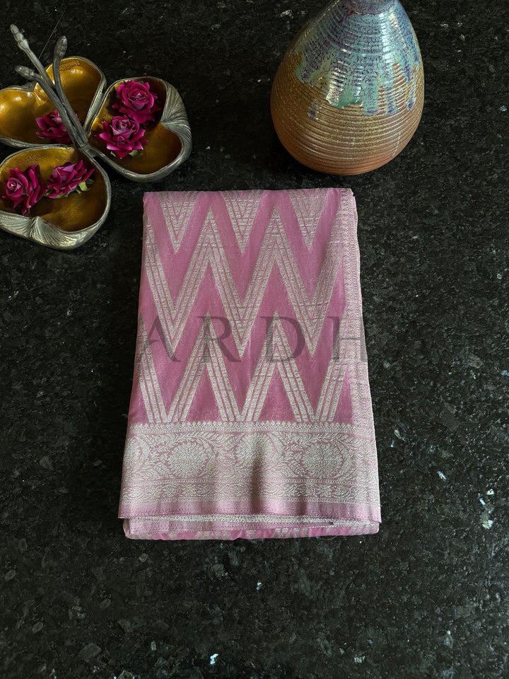 Soft and sheer pink saree ideal for elegant daywear