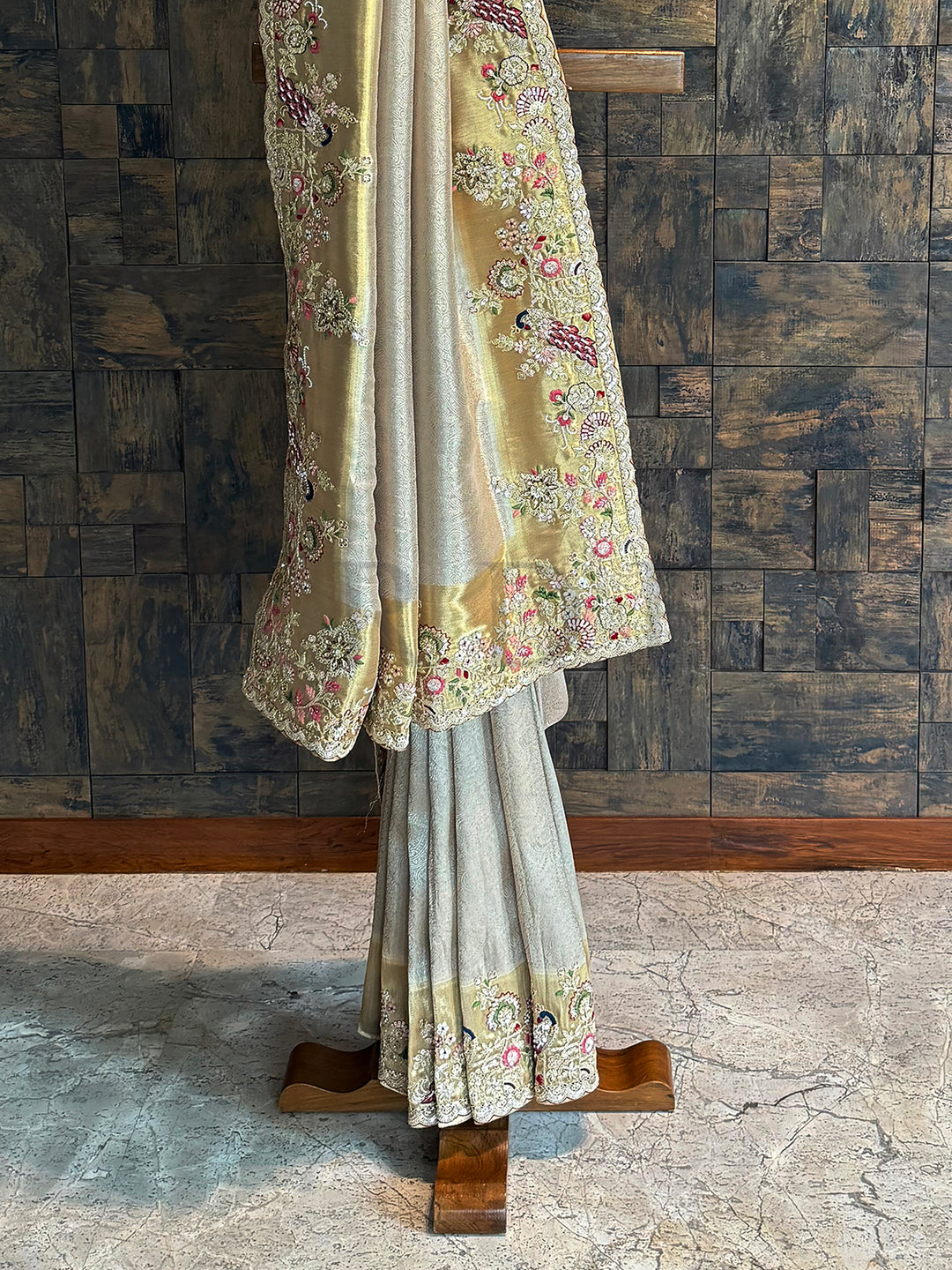 Regal chiku silk saree with scalloped lace and zari floral detailing for festive occasions