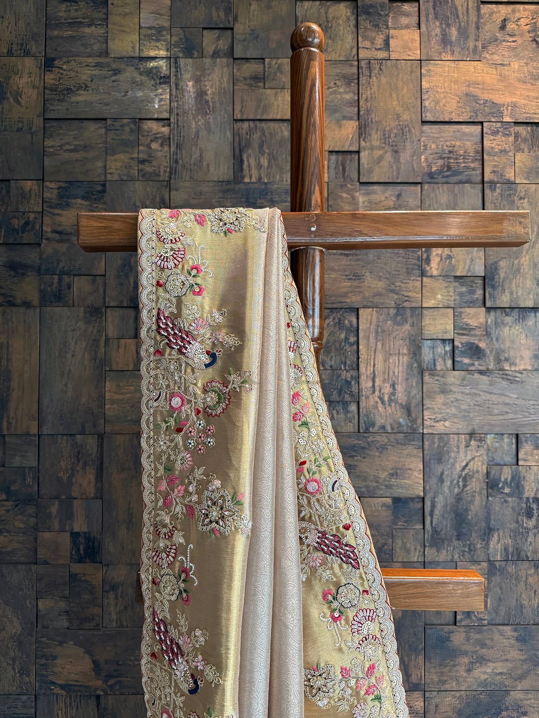 Traditional Kanjivaram tissue silk saree in beige-chiku shade with peacock motifs