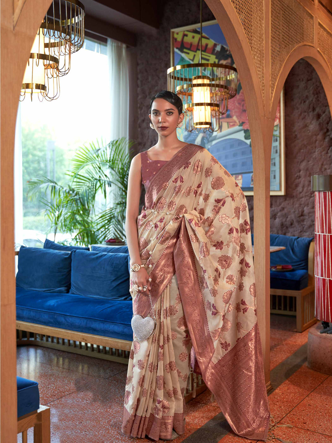 Cream Shimmer Organza Saree with Copper Zari Weaving and Contrast Border, featuring an Exquisite Floral Jangla Design—a perfect blend of Traditional Craftsmanship and Modern Elegance for Festive Occasions.
