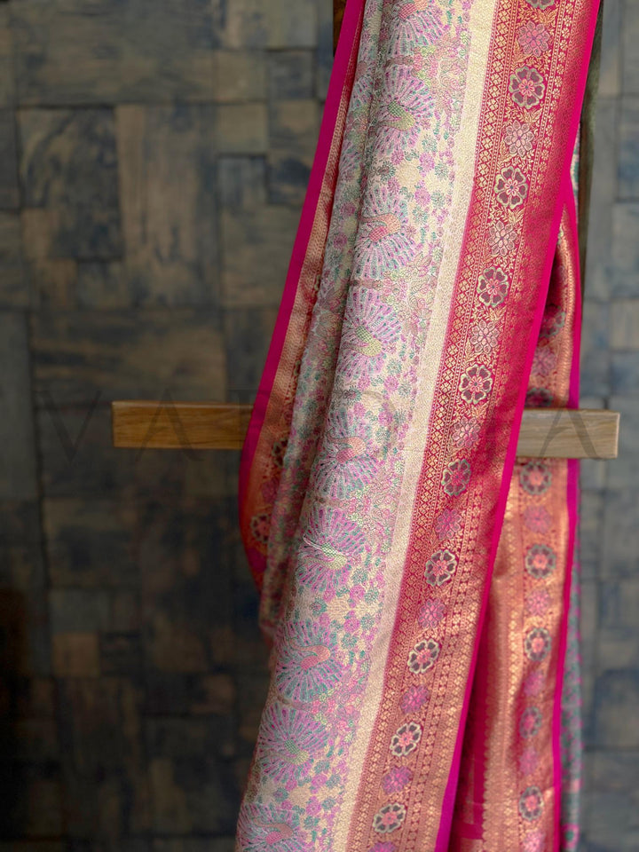 Cultural wedding wear saree in cream pink with traditional zari woven style. Graceful soft drape saree in art silk with pink border and unstitched blouse