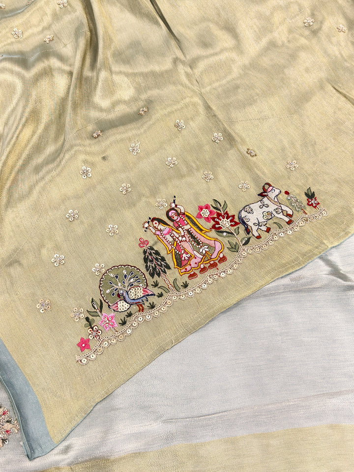 Embroidered fabric with a design of people and animals on a beige background