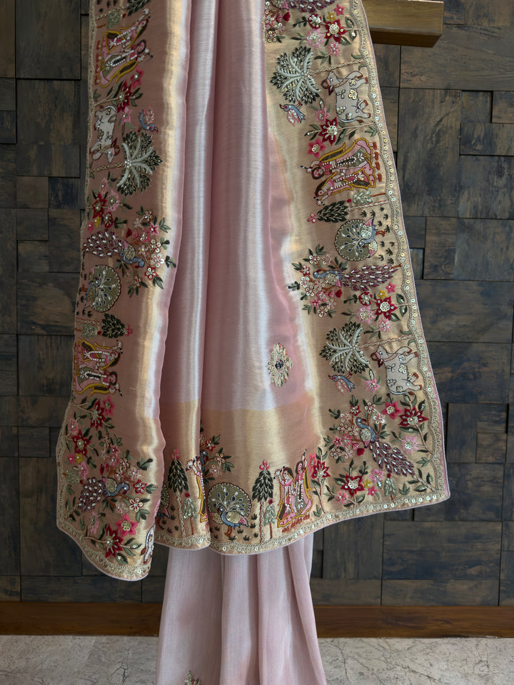 Embroidered garment with floral patterns on a wooden background
