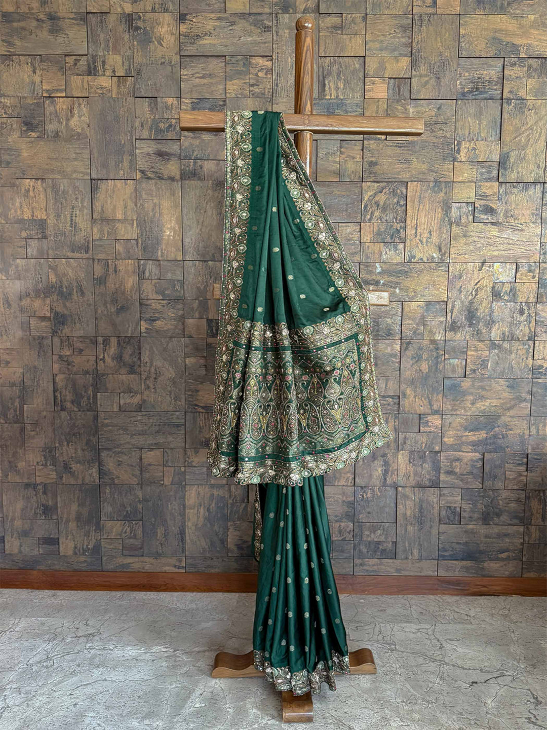 Exquisite Emerald Green Banarasi Jamawar satin silk saree featuring delicate hand-embroidered buttis for a regal and festive look.