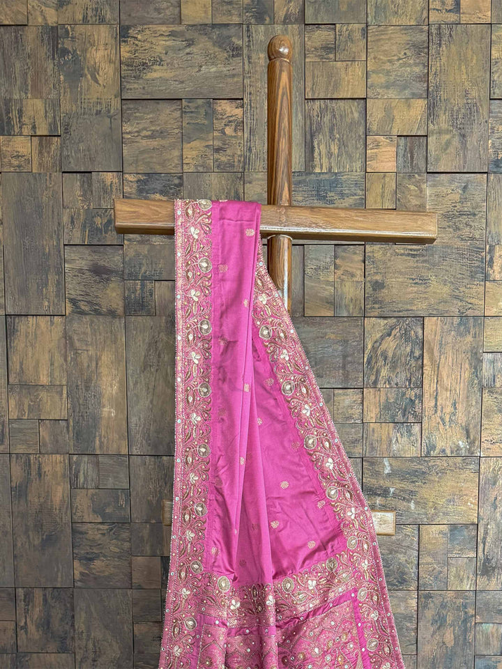 Luxurious lilac Banarasi satin silk saree with Jamawar motifs and delicate hand embroidery, ideal for festive occasions.