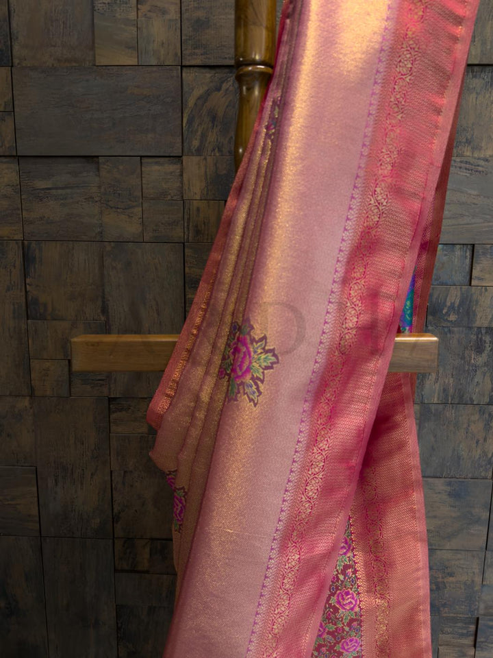 Textured zari border with elegant florals in kalamkari design, ideal for pooja and heritage wear., Matching blouse piece in lac pink with gold zari border for sophisticated traditional styling