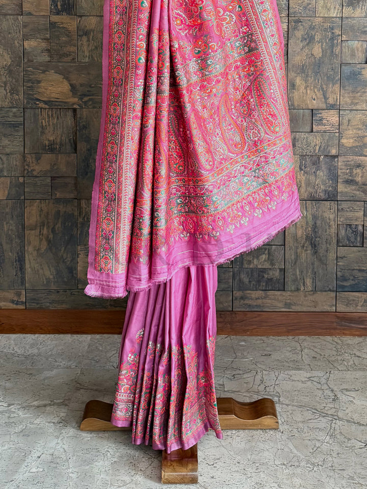 Elegant lilac raw silk saree with a rich Pashmina texture and delicate thread work embossing for a refined look.