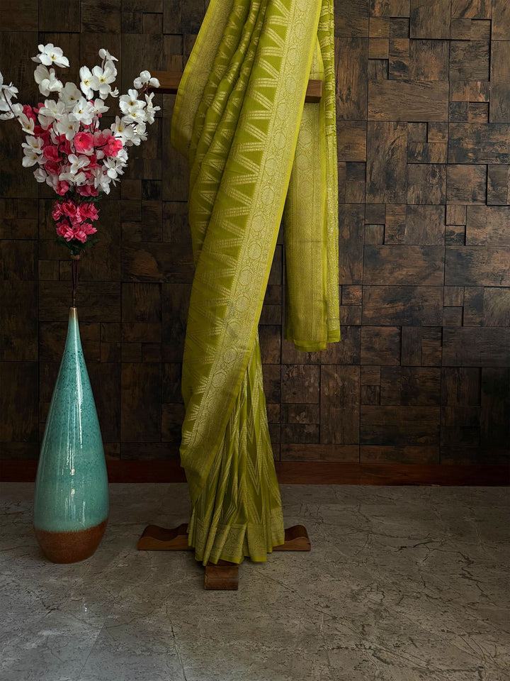Soft and sheer georgette saree for daytime functions in lime green