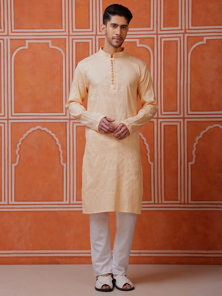 Men's peach silk blend kurta with a sophisticated jacquard weave and mandarin collar