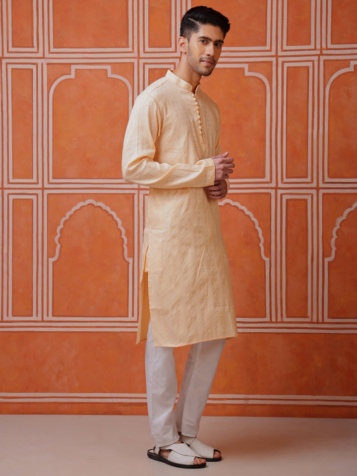 Peach mandarin collar kurta for men in a luxurious silk blend, offering both comfort and style