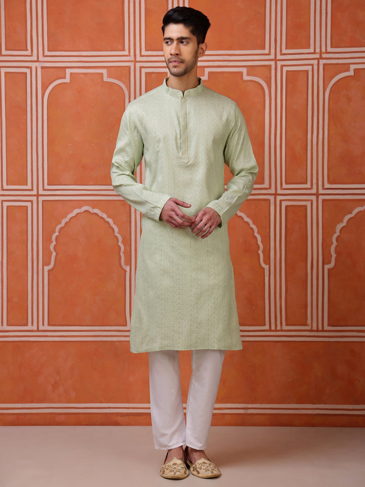 Men's light green silk blend kurta with subtle jacquard texture and mandarin collar