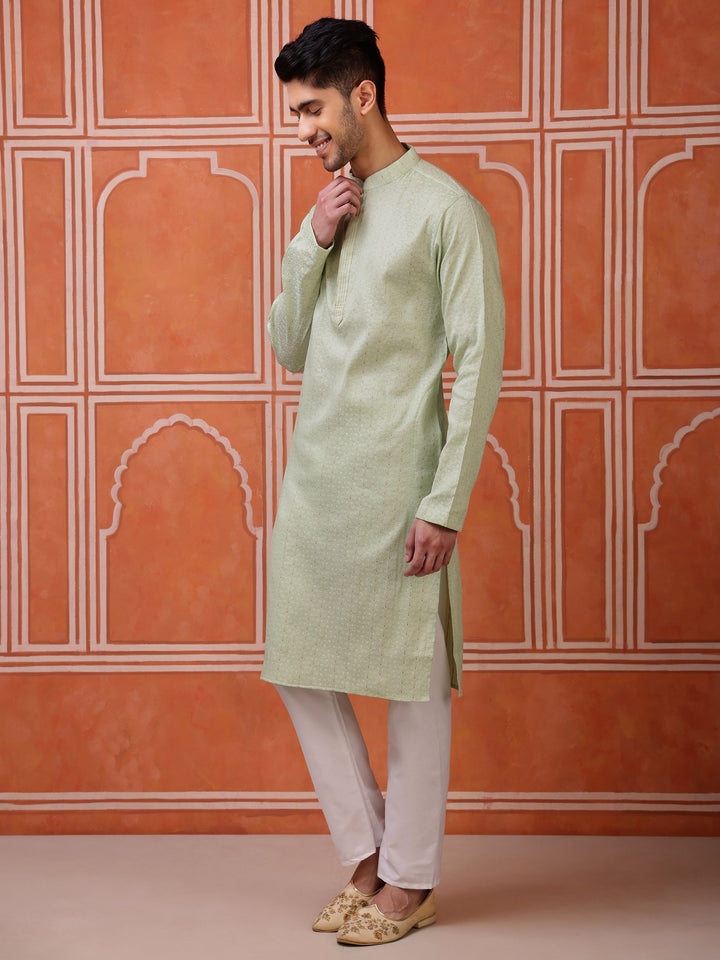Stylish and breathable light green traditional kurta for men, designed for comfort in warm weather