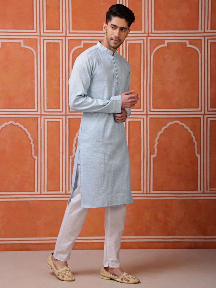 Close-up of the elegant side placket with fabric-covered buttons on the textured diamond-weave kurta