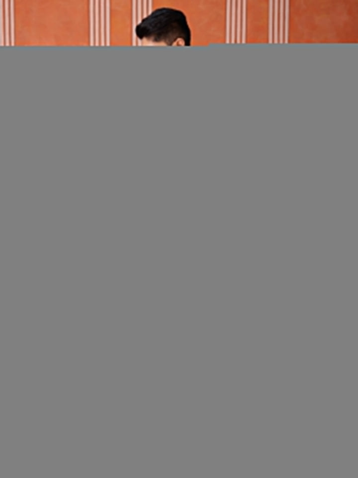 Back view of the sky blue kurta, showing its clean lines and comfortable cotton blend fabric