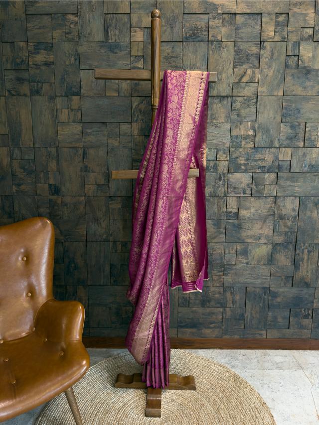 Front view of magenta kanjivaram silk saree with gold zari woven border and intricate detailing, perfect for festive and sangeet wear., Close-up of zari woven pallu in gold over magenta kanjivaram silk, featuring traditional motifs in luxurious jacquard weaving