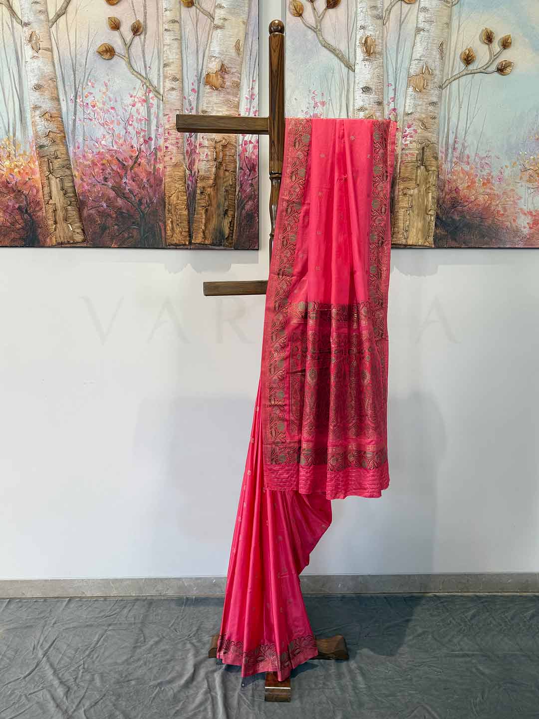 Bold Neon Fuchsia Jamawar satin saree with intricate designs, ideal for weddings and celebrations, offering a stunning, vibrant look.