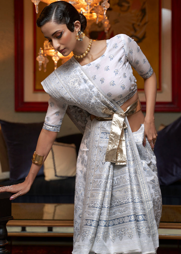 Elegant off white floral Kashmiri handloom silk saree featuring intricate modal weaving, ideal for festive events.