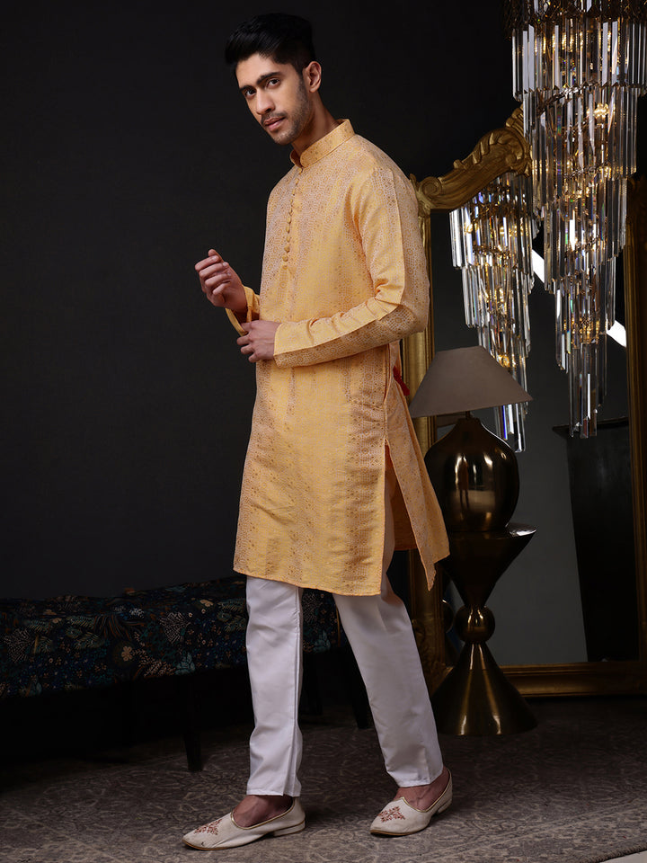 Peach-orange mandarin collar kurta for men, a statement piece for any celebratory wardrobe