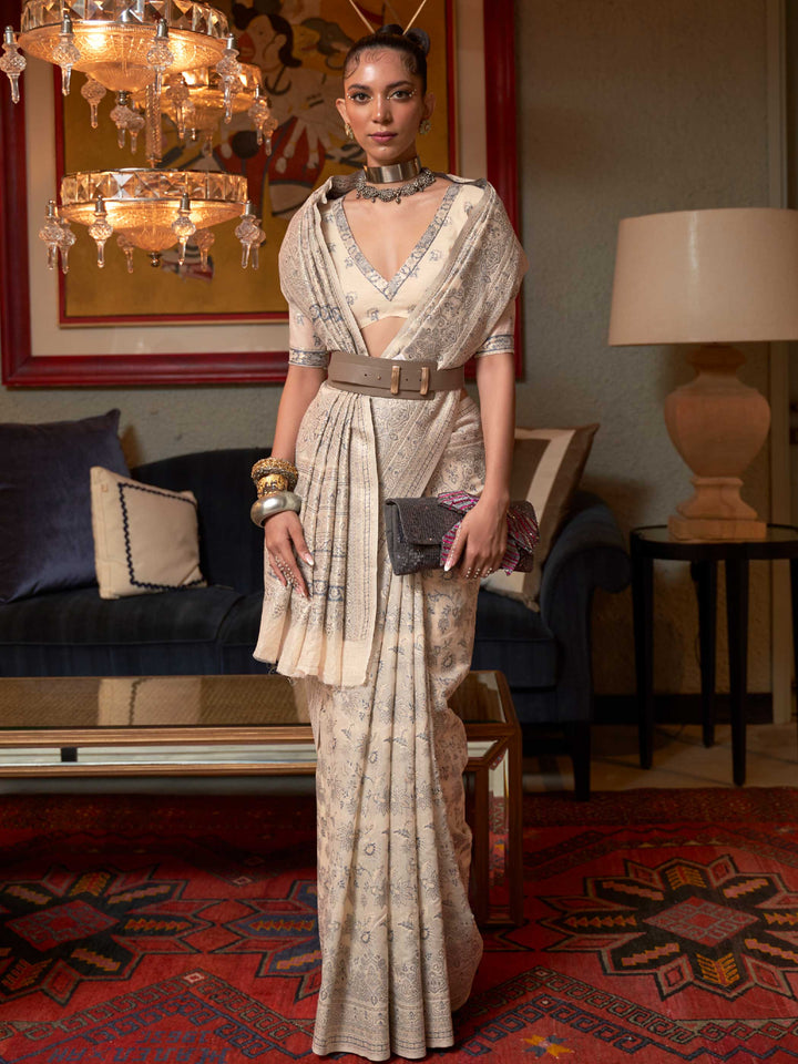 Elegant Pastel Brown Floral Woven Saree in Kashmiri Modal Silk, showcasing Traditional Handloom Techniques and Exquisite Floral Patterns, perfect for Cultural Celebrations.