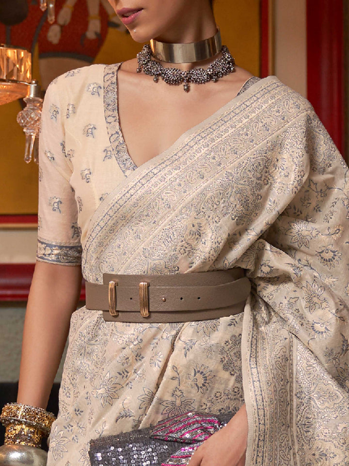 Traditional Pastel Brown Kashmiri Handloom Silk Saree adorned with Exquisite Floral Designs, offering a Graceful Drape and Sophisticated Appeal for Festive Occasions.