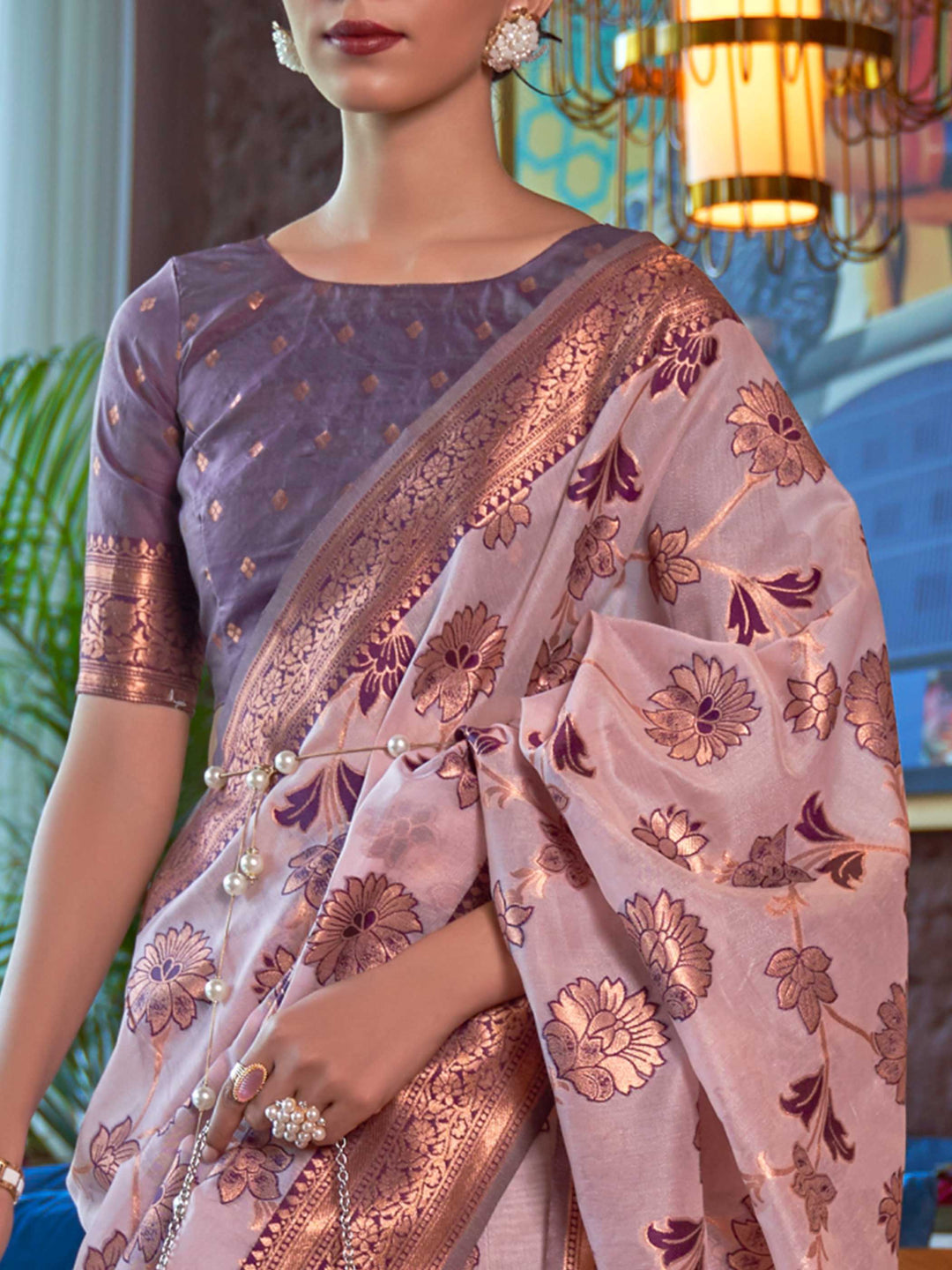 Handcrafted Pink Organza Chikankari Saree with Zari Lucknowi Handloom Weaving and a Contrast Woven Border, showcasing Traditional Phool Bel Motifs—a statement piece for Cultural Celebrations and Special Events.
