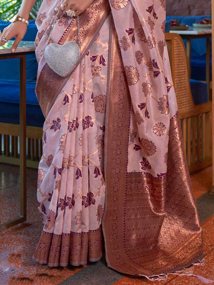 Luxurious Pink Shimmer Organza Saree enriched with Copper Zari Weaving and a Contrast Border, ensuring a Graceful Drape—suitable for Traditional Functions and Modern Festivities.