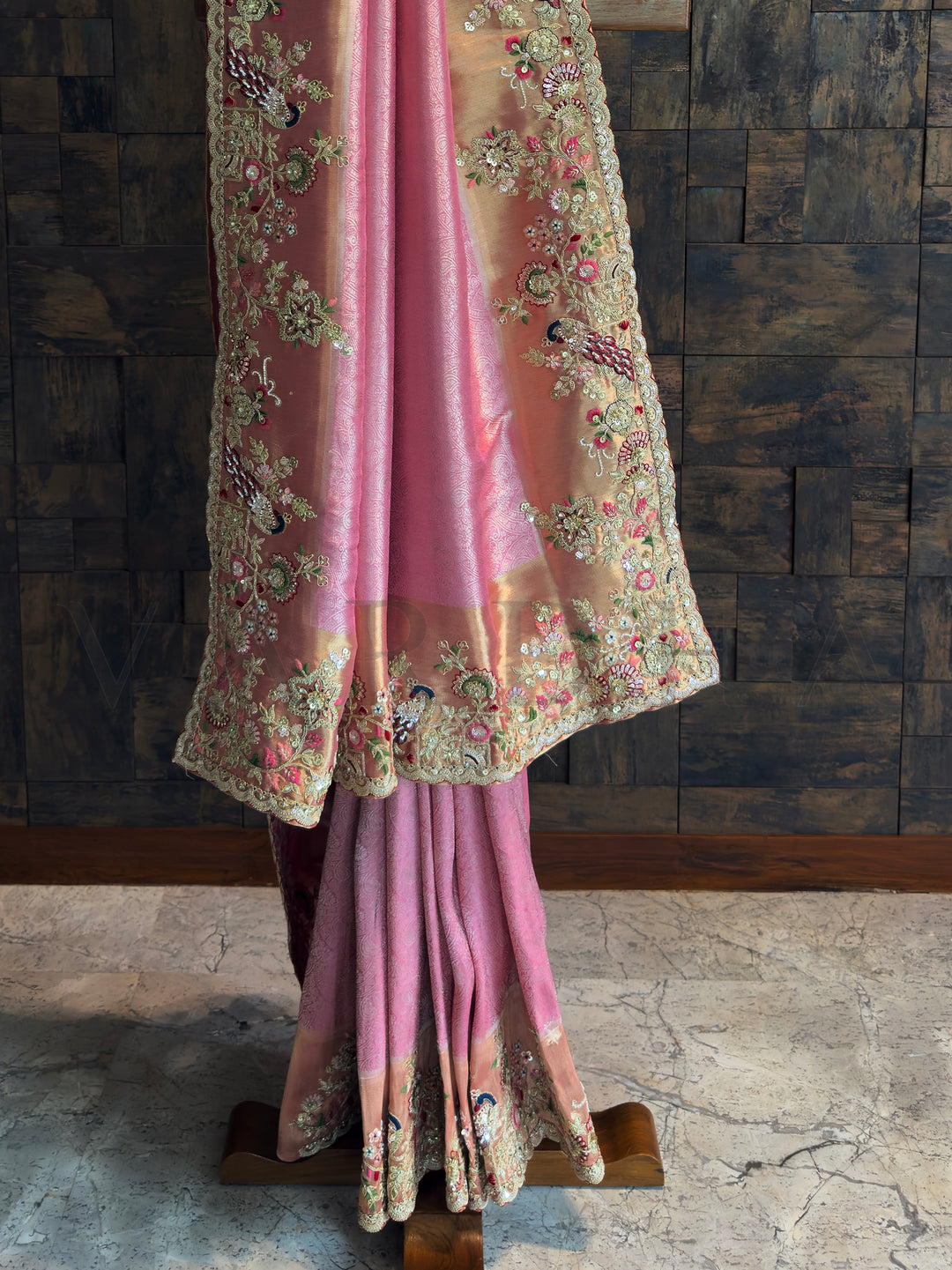 Designer pink Kanjivaram tissue saree with heavy embroidered border and unstitched blouse piece.