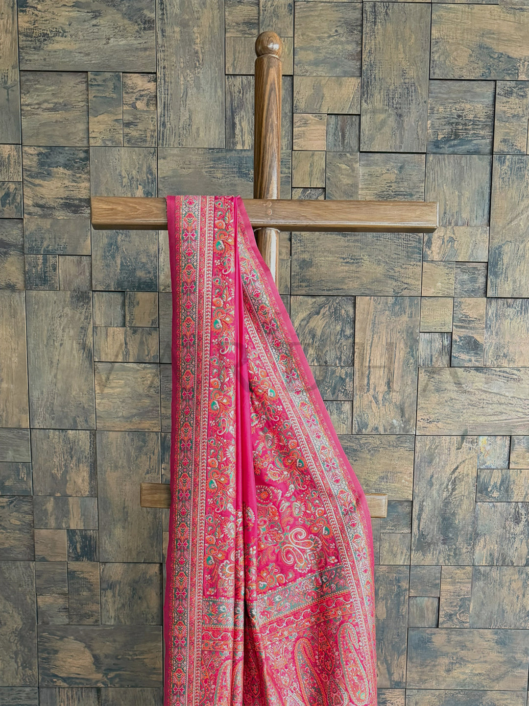 Luxurious Rani Pink Pashmina raw silk saree adorned with fine thread work embossing, ideal for festive and formal wear.