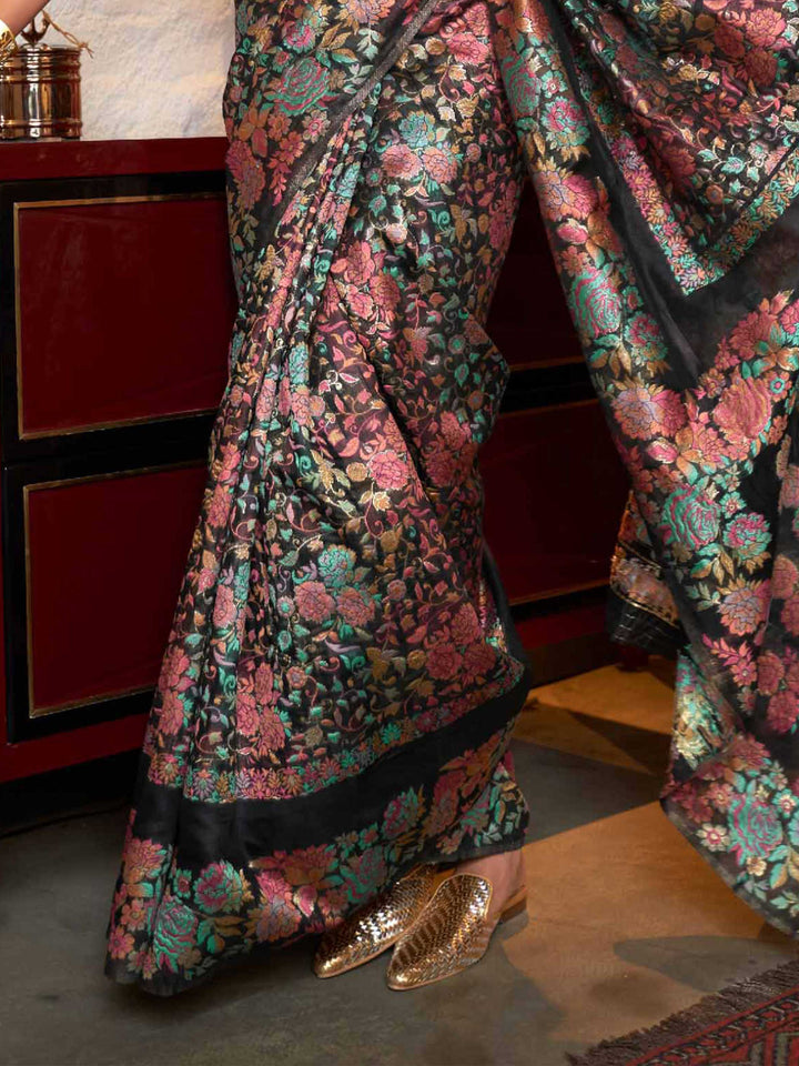 Shop the Raven Black Kashmiri Modal Handloom Borderless Saree at House of Vardha. This exquisite saree features a seamless handwoven design in luxurious modal fabric, making it perfect for festive and formal occasions.