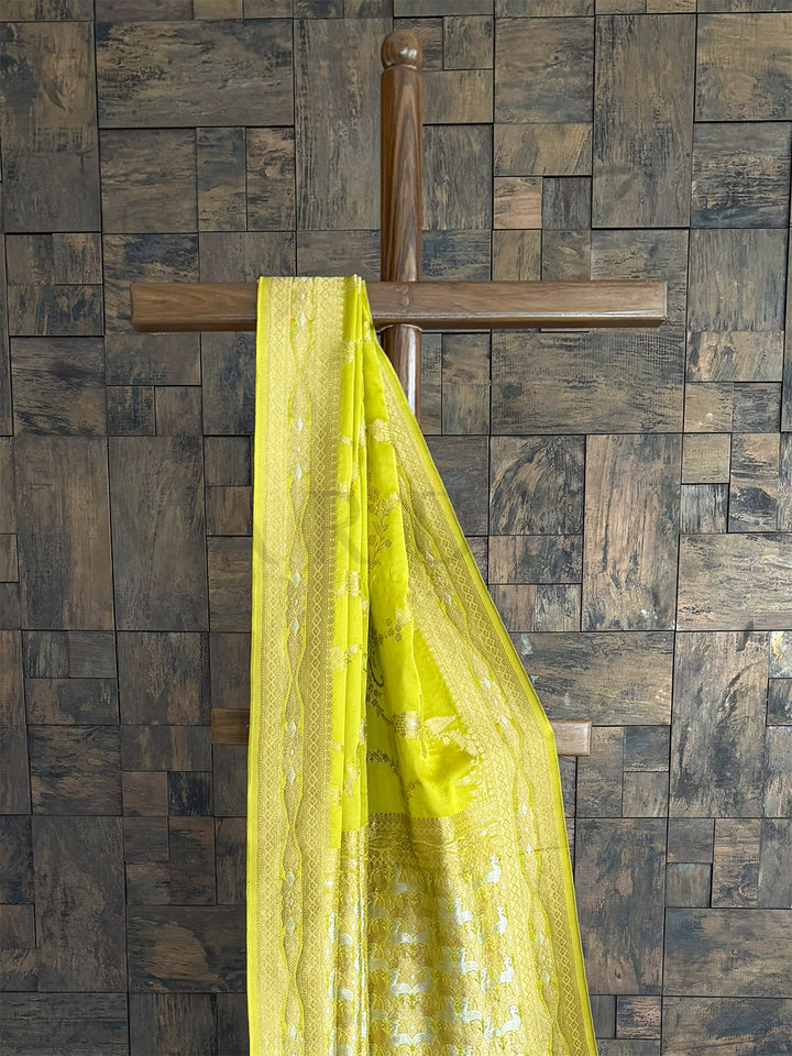 Indian Wedding & Bridal Elegance: Shimmering Lemon Yellow Satin Silk Saree with Intricate Dual Zari Gold & Silver Premium Silk, Surat. Premium Indian Ethnic Wear for Weddings & Bridal Surat Craftsmanship.