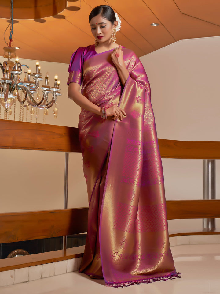 Model draped in Mauve Wine Kanjeevaram Silk Saree, showcasing full front view with gold zari detailing.