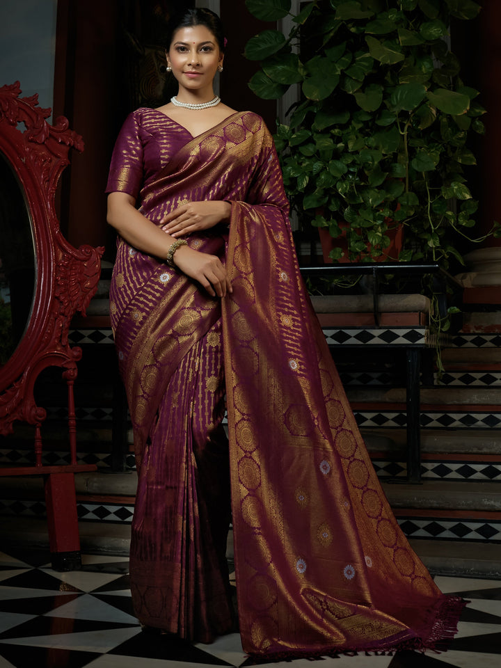 Model draped in Myrtle Wine Kanjeevaram Silk Saree with silver and copper zari, full front view with pleats and pallu draped over shoulder.