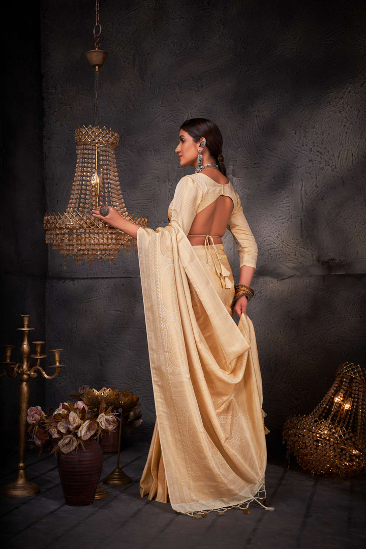 Side view showing the graceful fall and luster of the off-white silk blend.