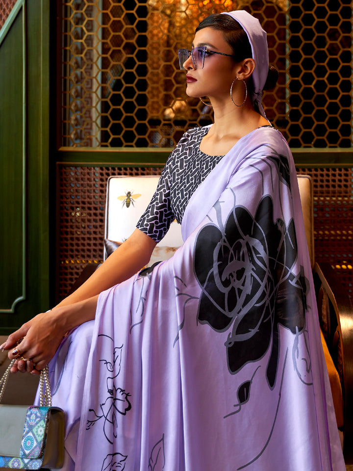 Elegant pale purple and charcoal Bollywood-style crepe saree adorned with stylish digital prints, suitable for festive celebrations.
