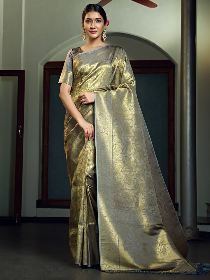 Model draped in Platinum Grey Kanjeevaram Saree showcasing the zari pallu with elegant posture