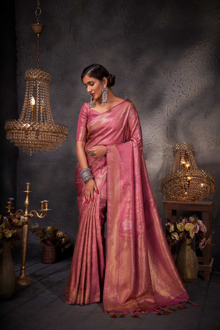 Pallu spread out to highlight woven metallic motifs and luxurious texture.