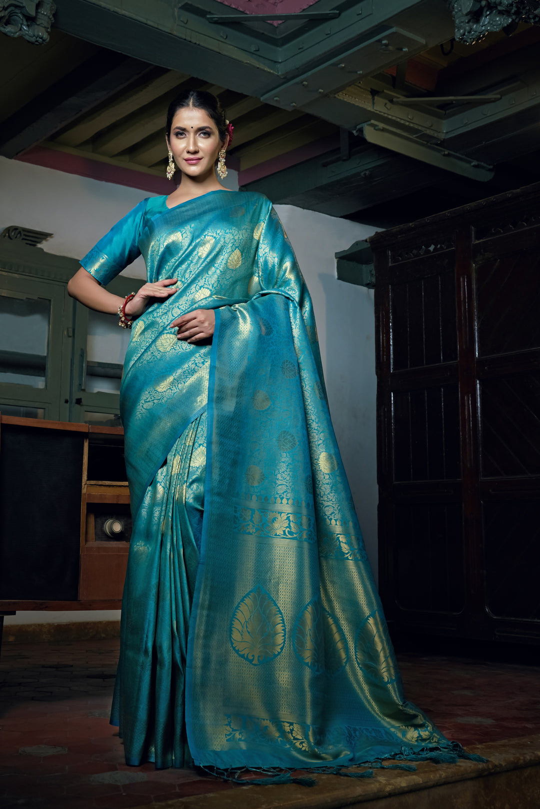 Back view of the saree drape highlighting the pallu and overall fall of the fabric.