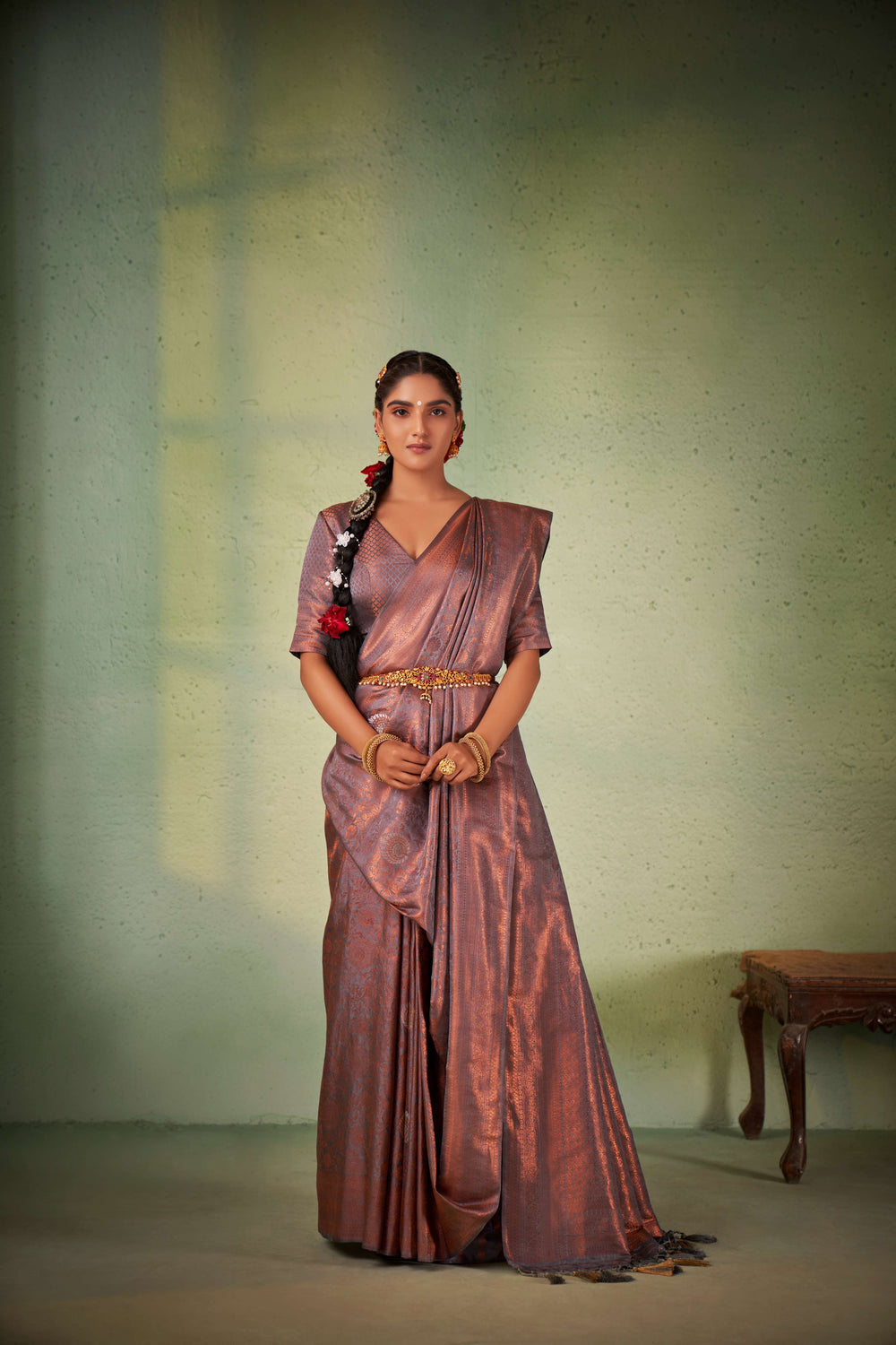 Draped saree view showing texture, sheen, and zari design.