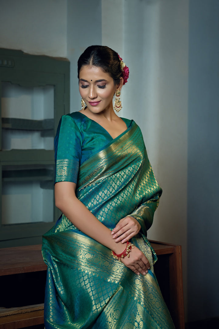 Blouse piece paired with the saree displayed for contrast.
