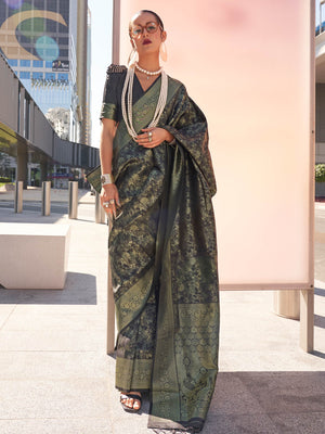 Forest Green–Olive kanjivaram silk saree with gold zari work, styled for traditional functions. Elegant Forest Green–Olive silk saree with woven borders and festive-ready pallu.