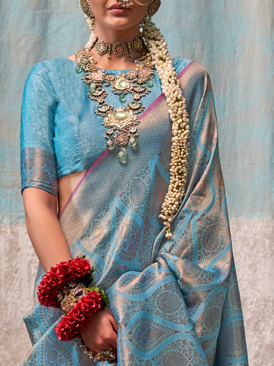 Blue and Peach two-tone handwoven silk saree with contrast selvage border and paisley weaving. This image captures the zoomed texture view illustrating fabric weave and print clarity, ideal for visualizing festive elegance, designer appeal, and modern styling inspiration. Perfect for online shoppers seeking detailed previews before purchase, enhancing saree visual merchandising and SEO-rich product display strategy.                                                                                             