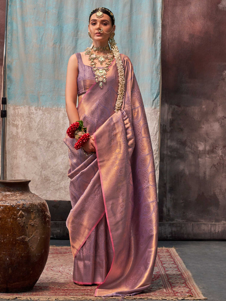 Lavender and Rose Gold two-tone handwoven silk saree with contrast selvage border and paisley weaving. This image captures the front drape view highlighting pallu fall and pleats alignment, ideal for visualizing festive elegance, designer appeal, and modern styling inspiration. Perfect for online shoppers seeking detailed previews before purchase, enhancing saree visual merchandising and SEO-rich product display strategy.                                                                                       