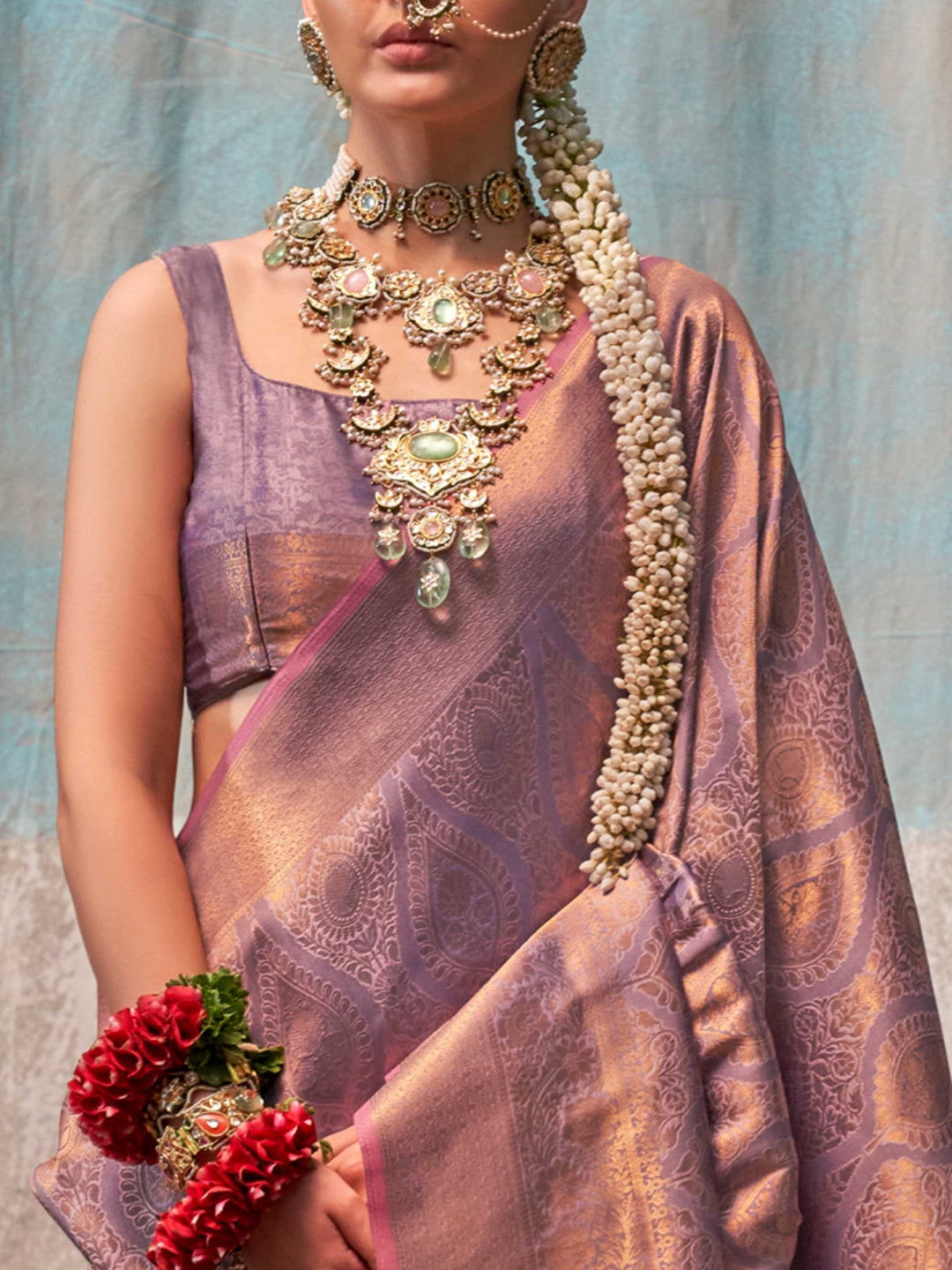 Lavender and Rose Gold two-tone handwoven silk saree with contrast selvage border and paisley weaving. This image captures the zoomed texture view illustrating fabric weave and print clarity, ideal for visualizing festive elegance, designer appeal, and modern styling inspiration. Perfect for online shoppers seeking detailed previews before purchase, enhancing saree visual merchandising and SEO-rich product display strategy.                                                                                     