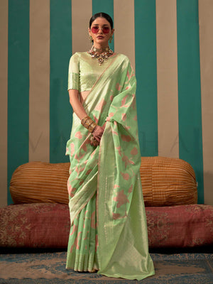 Mint Green and Peach linen saree with floral woven motifs and soft handloom texture This image captures the front drape view highlighting pallu fall and pleats alignment, ideal for visualizing festive elegance, designer appeal, and modern styling inspiration. Perfect for online shoppers seeking detailed previews before purchase, enhancing saree visual merchandising and SEO-rich product display strategy.                                                                                                          