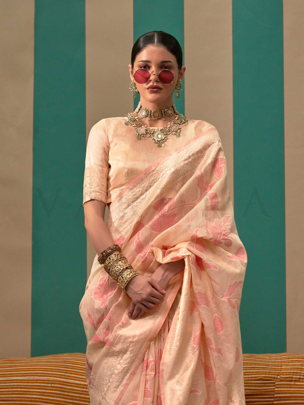 Champagne and Rose Pink linen saree with floral woven motifs and soft handloom texture This image captures the side angle view showcasing blouse styling and zari border detail, ideal for visualizing festive elegance, designer appeal, and modern styling inspiration. Perfect for online shoppers seeking detailed previews before purchase, enhancing saree visual merchandising and SEO-rich product display strategy.                                                                                                    