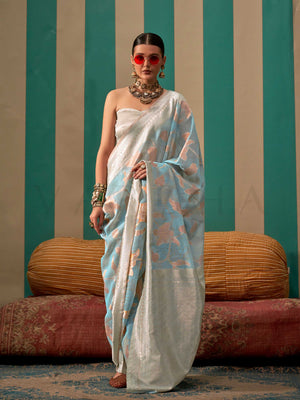 Sky Blue and Pearl White linen saree with floral woven motifs and soft handloom texture This image captures the front drape view highlighting pallu fall and pleats alignment, ideal for visualizing festive elegance, designer appeal, and modern styling inspiration. Perfect for online shoppers seeking detailed previews before purchase, enhancing saree visual merchandising and SEO-rich product display strategy.                                                                                                      