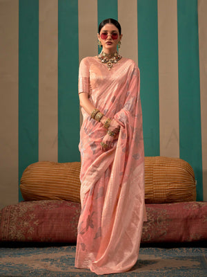 Blush Pink and Silver linen saree with floral woven motifs and soft handloom texture This image captures the front drape view highlighting pallu fall and pleats alignment, ideal for visualizing festive elegance, designer appeal, and modern styling inspiration. Perfect for online shoppers seeking detailed previews before purchase, enhancing saree visual merchandising and SEO-rich product display strategy.                                                                                                         