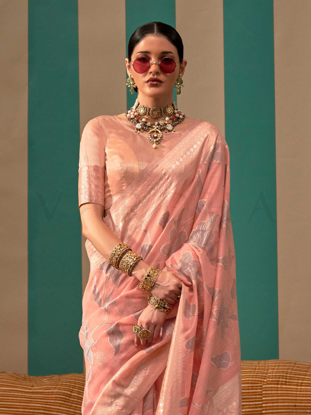 Blush Pink and Silver linen saree with floral woven motifs and soft handloom texture This image captures the side angle view showcasing blouse styling and zari border detail, ideal for visualizing festive elegance, designer appeal, and modern styling inspiration. Perfect for online shoppers seeking detailed previews before purchase, enhancing saree visual merchandising and SEO-rich product display strategy.                                                                                                      